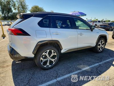 Trzecie zdjęcie samochodu z tyłu: 2023 TOYOTA RAV4 PRIME XSE VIN:JTMEB3FV4PD151897 - miniatura