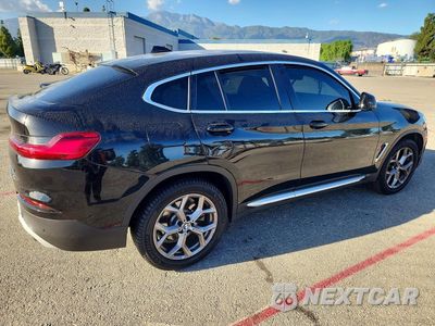 Trzecie zdjęcie samochodu z tyłu: 2021 BMW X4 XDRIVE30I VIN:5UX2V1C05M9G91217 - miniatura