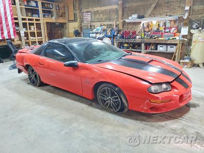Czwarte zdjęcie samochodu z boku: 1999 CHEVROLET CAMARO Z28 VIN:2G1FP22G4X2135866 - miniatura
