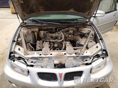 Zdjęcie 11 z 12 samochodu: 1999 PONTIAC GRAND PRIX GT VIN:1G2WP12K5XF223687 - miniatura