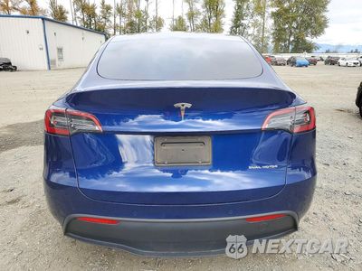 Zdjęcie 6 z 13 samochodu: 2022 TESLA MODEL Y VIN:7SAYGAEE9NF506401 - miniatura