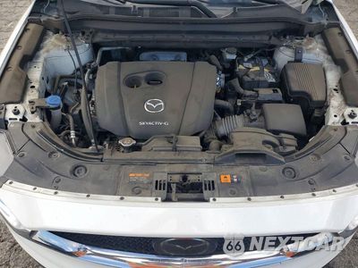 Zdjęcie 11 z 12 samochodu: 2021 MAZDA CX-5 GRAND TOURING VIN:JM3KFBDM6M0379289 - miniatura