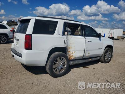 Trzecie zdjęcie samochodu z tyłu: 2017 CHEVROLET TAHOE C1500 LT VIN:1GNSCBKC9HR122499 - miniatura