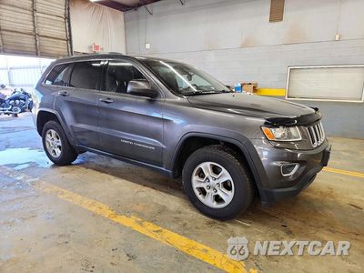 Czwarte zdjęcie samochodu z boku: 2014 JEEP GRAND CHEROKEE LAREDO VIN:1C4RJFAG8EC177789 - miniatura