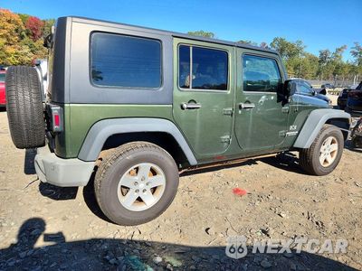 Trzecie zdjęcie samochodu z tyłu: 2009 JEEP WRANGLER UNLIMITED X VIN:1J4GA39189L751670 - miniatura