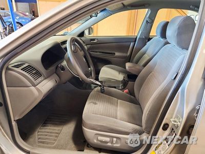 Zdjęcie 7 z 12 samochodu: 2006 TOYOTA CAMRY LE VIN:4T1BE30K16U140472 - miniatura