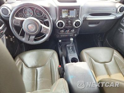 Zdjęcie 8 z 12 samochodu: 2016 JEEP WRANGLER UNLIMITED SAHARA VIN:1C4BJWEGXGL114479 - miniatura