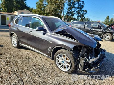 Czwarte zdjęcie samochodu z boku: 2022 BMW X5 XDRIVE45E VIN:5UXTA6C00N9K74230 - miniatura