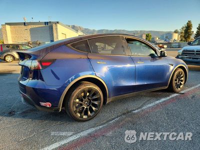 Trzecie zdjęcie samochodu z tyłu: 2023 TESLA MODEL Y VIN:7SAYGDEE8PF937655 - miniatura