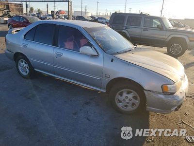 Czwarte zdjęcie samochodu z boku: 1999 NISSAN SENTRA XE VIN:3N1AB41D7XL076158 - miniatura
