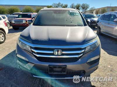 Piąte zdjęcie samochodu w środku: 2017 HONDA PILOT ELITE VIN:5FNYF6H05HB054593 - miniatura