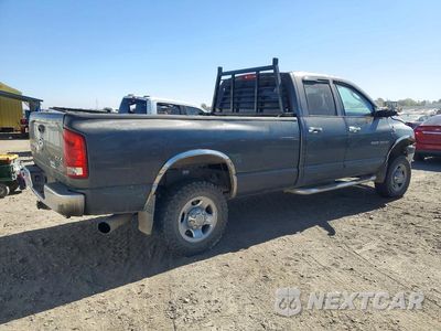 Trzecie zdjęcie samochodu z tyłu: 2004 DODGE RAM 3500 ST VIN:3D7LU38C24G114431 - miniatura