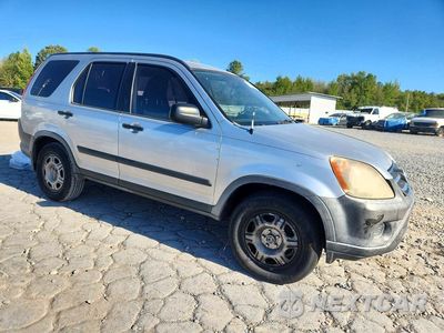 Czwarte zdjęcie samochodu z boku: 2006 HONDA CR-V LX VIN:JHLRD78576C044835 - miniatura
