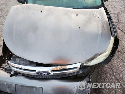 Zdjęcie 11 z 12 samochodu: 2010 FORD FOCUS S VIN:1FAHP3EN4AW292339 - miniatura