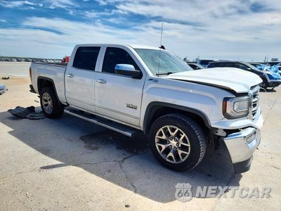 Czwarte zdjęcie samochodu z boku: 2018 GMC SIERRA K1500 SLT VIN:3GTU2NEC0JG619349 - miniatura