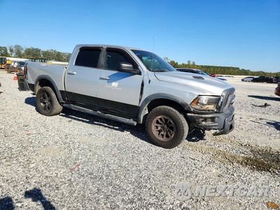 Czwarte zdjęcie samochodu z boku: 2016 RAM 1500 REBEL VIN:1C6RR7YG3GS121327 - miniatura