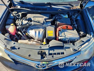 Zdjęcie 11 z 12 samochodu: 2013 TOYOTA CAMRY HYBRID XLE VIN:4T1BD1FK1DU075036 - miniatura
