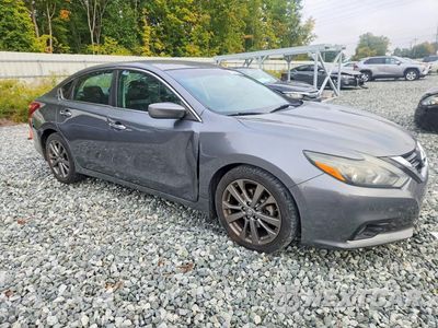 Czwarte zdjęcie samochodu z boku: 2018 NISSAN ALTIMA 2.5 SR VIN:1N4AL3AP6JC147468 - miniatura