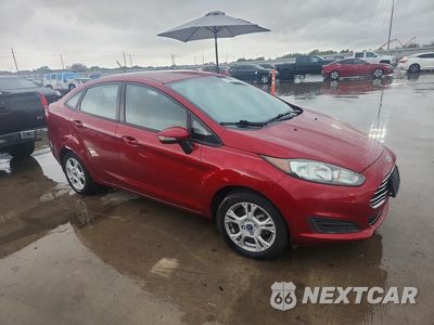 Czwarte zdjęcie samochodu z boku: 2014 FORD FIESTA SE VIN:3FADP4BJ2EM216596 - miniatura