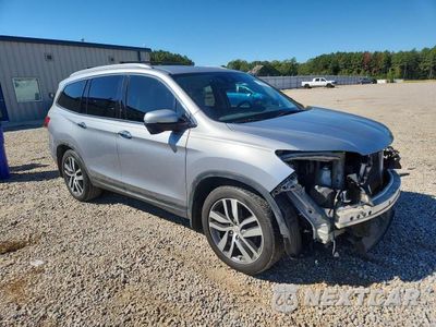 Czwarte zdjęcie samochodu z boku: 2017 HONDA PILOT TOURING VIN:5FNYF5H92HB026467 - miniatura