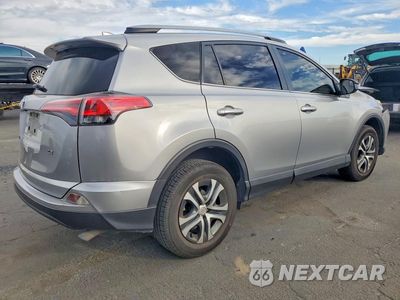 Trzecie zdjęcie samochodu z tyłu: 2018 TOYOTA RAV4 LE VIN:JTMZFREV7JJ175517 - miniatura