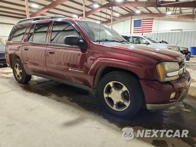 Czwarte zdjęcie samochodu z boku: 2004 CHEVROLET TRAILBLAZER EXT LS VIN:1GNET16S246239507 - miniatura
