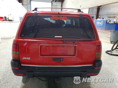 Zdjęcie 6 z 14 samochodu: 1998 JEEP GRAND CHEROKEE LAREDO VIN:1J4GZ58S3WC188859 - miniatura