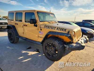 Czwarte zdjęcie samochodu z boku: 2014 JEEP WRANGLER UNLIMITED SAHARA VIN:1C4BJWEG5EL110854 - miniatura