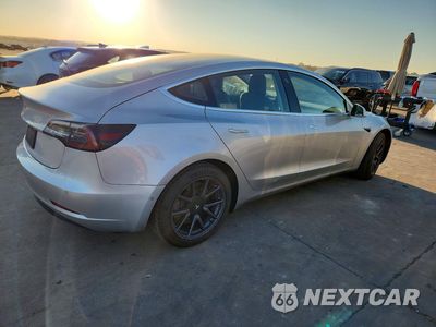 Trzecie zdjęcie samochodu z tyłu: 2018 TESLA MODEL 3 VIN:5YJ3E1EA5JF058761 - miniatura