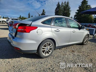 Trzecie zdjęcie samochodu z tyłu: 2015 FORD FOCUS SE VIN:1FADP3F20FL241786 - miniatura