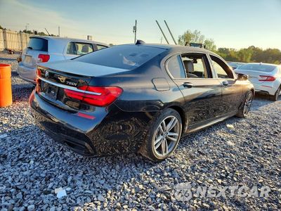 Trzecie zdjęcie samochodu z tyłu: 2018 BMW 750 XI VIN:WBA7F2C5XJG424405 - miniatura