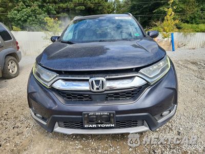 Piąte zdjęcie samochodu w środku: 2017 HONDA CR-V TOURING VIN:7FARW1H99HE033322 - miniatura