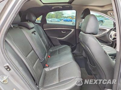 Zdjęcie 10 z 13 samochodu: 2013 HYUNDAI ELANTRA GT BASE VIN:KMHD35LE7DU092652 - miniatura