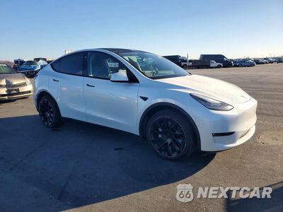Czwarte zdjęcie samochodu z boku: 2023 TESLA MODEL Y VIN:7SAYGDEE2PF585902 - miniatura