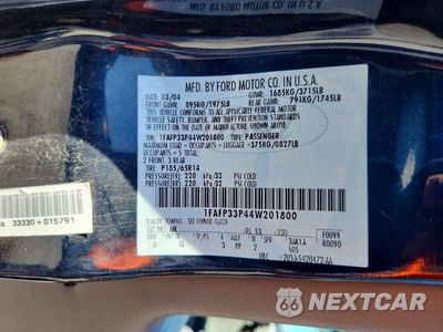 Zdjęcie 12 z 12 samochodu: 2004 FORD FOCUS LX VIN:1FAFP33P44W201800 - miniatura