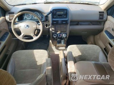 Zdjęcie 8 z 13 samochodu: 2004 HONDA CR-V LX VIN:SHSRD78434U235133 - miniatura