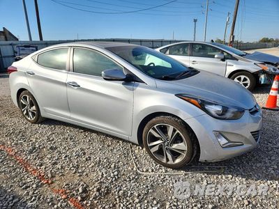 Czwarte zdjęcie samochodu z boku: 2014 HYUNDAI ELANTRA LIMITED VIN:5NPDH4AE3EH496966 - miniatura