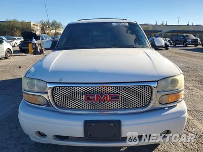 Piąte zdjęcie samochodu w środku: 2002 GMC DENALI XL K1500 VIN:1GKFK66U92J102304 - miniatura