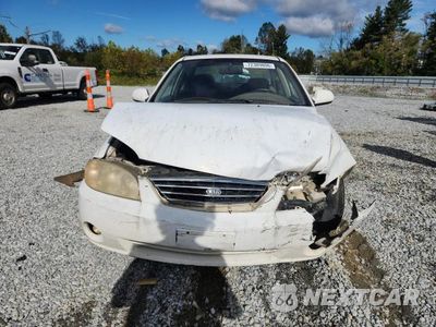 Piąte zdjęcie samochodu w środku: 2004 KIA SPECTRA BASE VIN:KNAFB121845312735 - miniatura