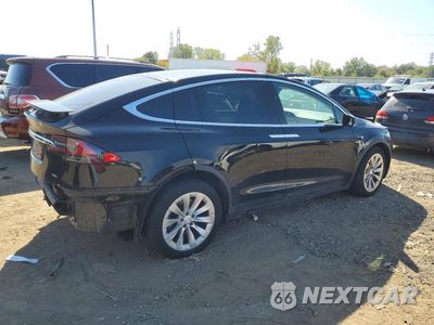 Trzecie zdjęcie samochodu z tyłu: 2018 TESLA MODEL X VIN:5YJXCDE27JF126978 - miniatura