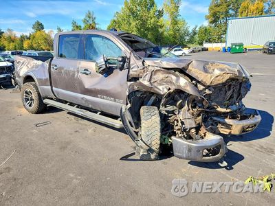 Czwarte zdjęcie samochodu z boku: 2016 NISSAN TITAN XD PLATINUM RESERVE VIN:1N6BA1F45GN507587 - miniatura