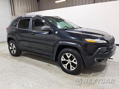 Czwarte zdjęcie samochodu z boku: 2014 JEEP CHEROKEE TRAILHAWK VIN:1C4PJMBS0EW255978 - miniatura