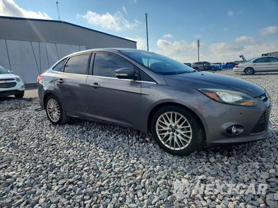 Czwarte zdjęcie samochodu z boku: 2013 FORD FOCUS TITANIUM VIN:1FADP3J24DL383692 - miniatura