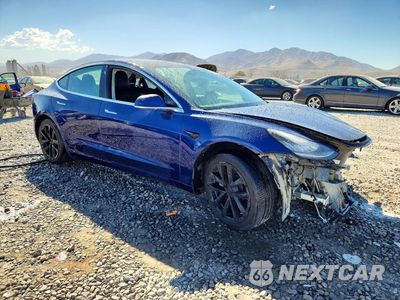 Czwarte zdjęcie samochodu z boku: 2019 TESLA MODEL 3 VIN:5YJ3E1EB0KF452646 - miniatura