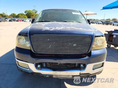 Piąte zdjęcie samochodu w środku: 2004 FORD F150 VIN:1FTRX12W44NA30525 - miniatura