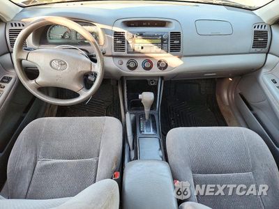 Zdjęcie 8 z 12 samochodu: 2003 TOYOTA CAMRY LE VIN:JTDBE32K730181404 - miniatura
