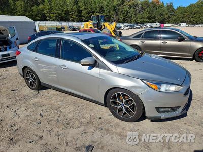Czwarte zdjęcie samochodu z boku: 2017 FORD FOCUS SEL VIN:1FADP3H29HL289612 - miniatura