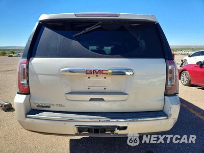 Zdjęcie 6 z 14 samochodu: 2015 GMC YUKON XL DENALI VIN:1GKS2JKJ4FR158767 - miniatura