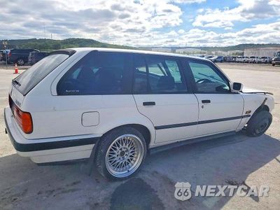 Trzecie zdjęcie samochodu z tyłu: 1998 BMW 320 I VIN:WBAAH620903819050 - miniatura