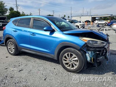 Czwarte zdjęcie samochodu z boku: 2017 HYUNDAI TUCSON SE VIN:KM8J23A43HU539407 - miniatura